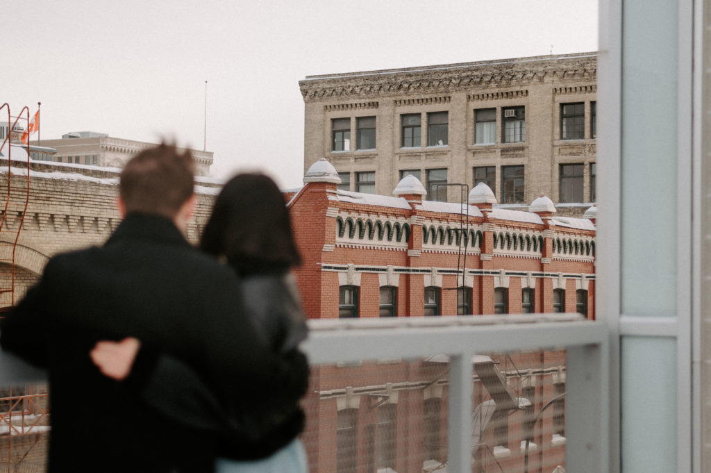 Downtown Winnipeg couples shoot on a rooftop